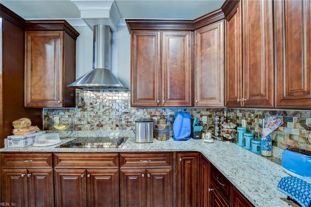 101 Utah St, Portsmouth, VA 23701 - kitchen featuring wall chimney range hood, light stone countertops, tasteful backsplash, and black electric cooktop