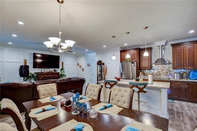 101 Utah St, Portsmouth, VA 23701 - dining room featuring light wood-style floors, a chandelier, crown molding, and recessed lighting