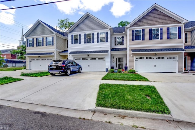 101 Utah St, Portsmouth, VA 23701 - view of front of house featuring an attached garage and concrete driveway