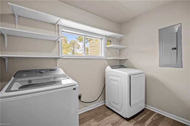 6304 Ball Ave, Norfolk, VA 23518 - laundry area with electric panel, baseboards, and washer and dryer