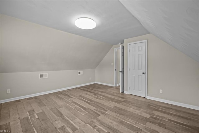 6304 Ball Ave, Norfolk, VA 23518 - additional living space with wood finished floors, lofted ceiling, and baseboards