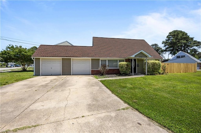 6304 Ball Ave, Norfolk, VA 23518 - view of front facade featuring a garage, driveway, and brick siding