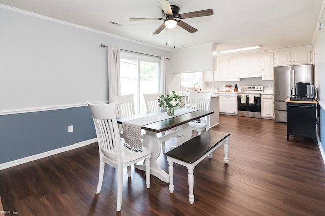 1 Lake Walk Xing, Hampton, VA 23666 - dining space featuring ceiling fan, dark wood finished floors, crown molding, and baseboards