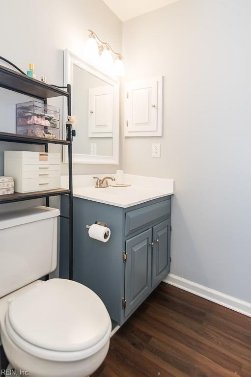 1 Lake Walk Xing, Hampton, VA 23666 - half bathroom featuring wood finished floors, vanity, baseboards, and toilet