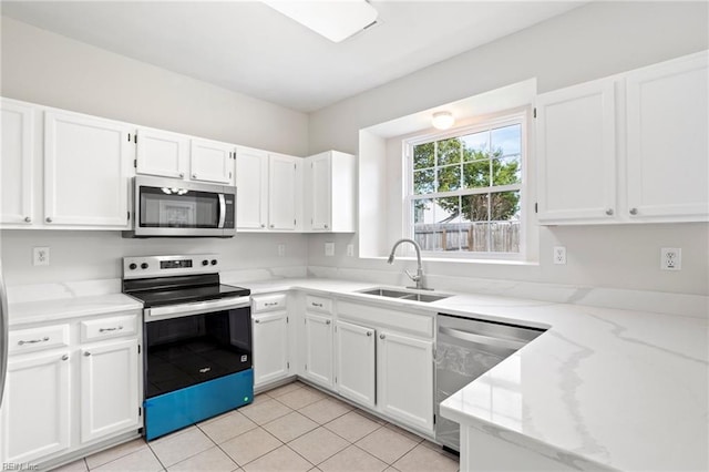 405 Millwright Way, Chesapeake, VA 23323 - kitchen with appliances with stainless steel finishes, a sink, light stone counters, and white cabinetry