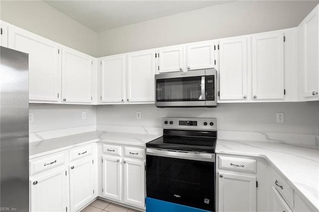 405 Millwright Way, Chesapeake, VA 23323 - kitchen with appliances with stainless steel finishes, light stone countertops, and white cabinetry