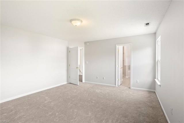 405 Millwright Way, Chesapeake, VA 23323 - unfurnished bedroom with carpet floors, baseboards, and ensuite bath