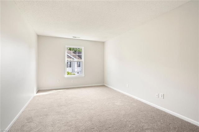 405 Millwright Way, Chesapeake, VA 23323 - spare room featuring carpet floors, a textured ceiling, and baseboards