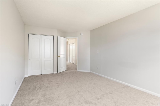 405 Millwright Way, Chesapeake, VA 23323 - unfurnished bedroom featuring carpet, baseboards, and a closet