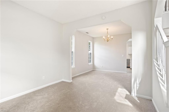 405 Millwright Way, Chesapeake, VA 23323 - empty room with carpet, a chandelier, and baseboards
