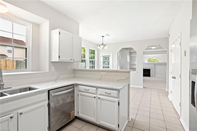 405 Millwright Way, Chesapeake, VA 23323 - kitchen featuring dishwasher, a peninsula, a chandelier, light tile patterned floors, and white cabinetry