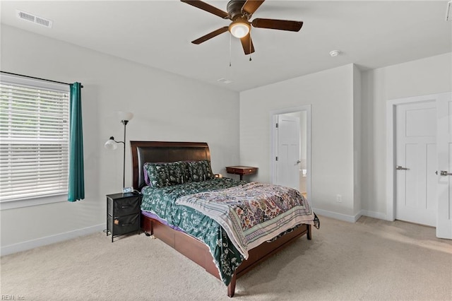 230 Independence St, Portsmouth, VA 23701 - bedroom with carpet, baseboards, a ceiling fan, and connected bathroom