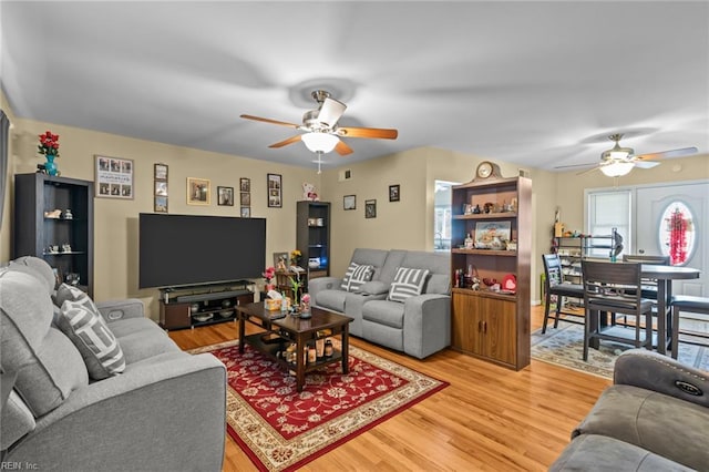 8332 Halprin Dr, Norfolk, VA 23518 - living area with ceiling fan and light wood-style floors