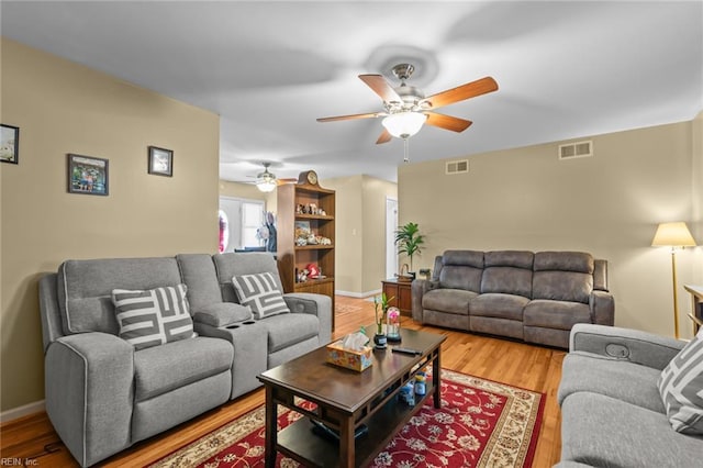 8332 Halprin Dr, Norfolk, VA 23518 - living area with a ceiling fan, wood finished floors, and baseboards