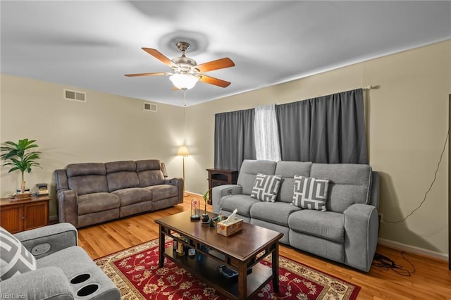 8332 Halprin Dr, Norfolk, VA 23518 - living area featuring ceiling fan, wood finished floors, and baseboards