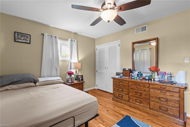 8332 Halprin Dr, Norfolk, VA 23518 - bedroom with light wood-style floors, baseboards, a closet, and a ceiling fan