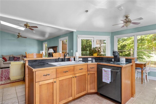 6052 Newport Cres, Norfolk, VA 23505 - kitchen featuring dishwashing machine, open floor plan, a sink, a ceiling fan, and vaulted ceiling