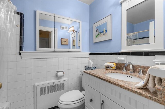 6052 Newport Cres, Norfolk, VA 23505 - bathroom with radiator, tile walls, toilet, a shower with shower curtain, and wainscoting