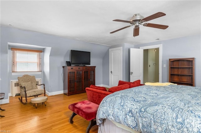 6052 Newport Cres, Norfolk, VA 23505 - bedroom featuring wood finished floors, radiator heating unit, baseboards, and ceiling fan