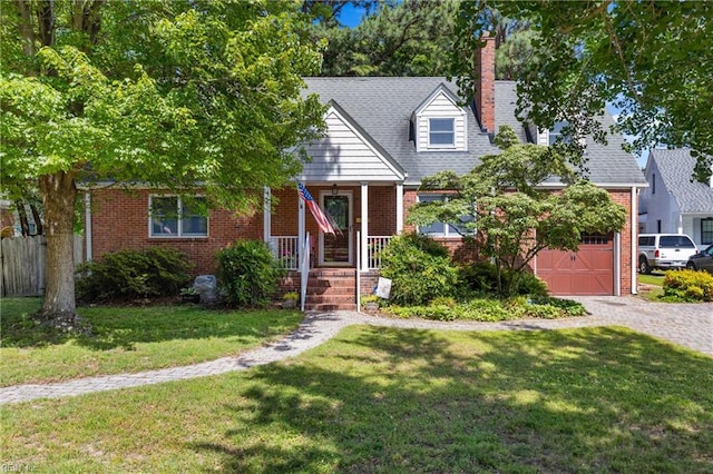 6052 Newport Cres, Norfolk, VA 23505 - view of front of home featuring covered porch, brick siding, a front yard, a chimney, and driveway