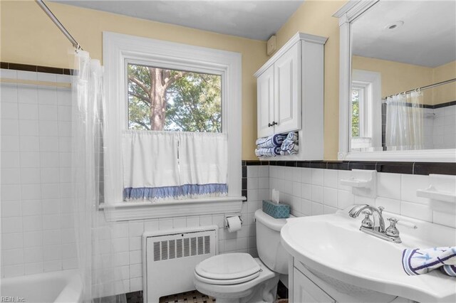 6052 Newport Cres, Norfolk, VA 23505 - full bathroom with radiator, tile walls, a sink, plenty of natural light, and toilet