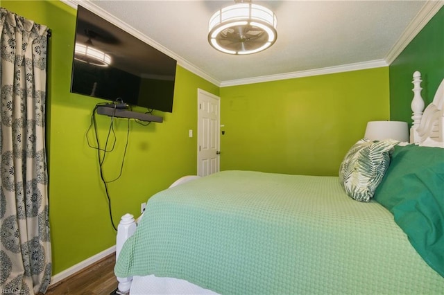 713 Quesnel Dr, Virginia Beach, VA 23454 - bedroom with ornamental molding, wood finished floors, and baseboards