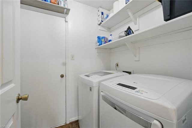 713 Quesnel Dr, Virginia Beach, VA 23454 - laundry area featuring washing machine and clothes dryer and wood finished floors