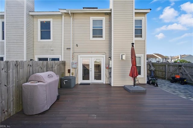 713 Quesnel Dr, Virginia Beach, VA 23454 - back of house with french doors, a deck, a fenced backyard, central AC, and a chimney