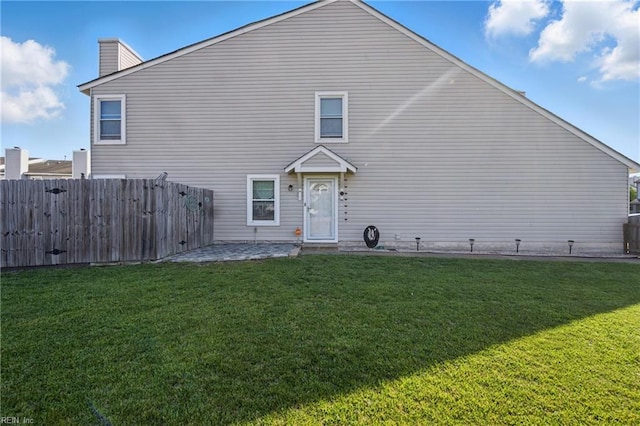 713 Quesnel Dr, Virginia Beach, VA 23454 - back of house featuring a chimney
