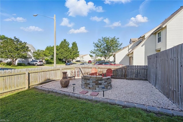 713 Quesnel Dr, Virginia Beach, VA 23454 - view of patio featuring a fire pit and a residential view