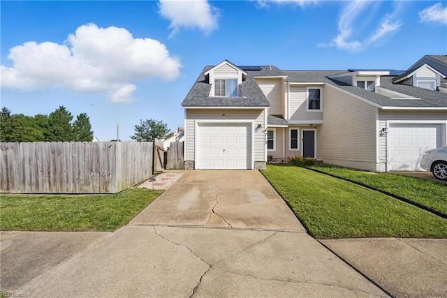 713 Quesnel Dr, Virginia Beach, VA 23454 - view of front of property featuring solar panels, roof with shingles, driveway, and an attached garage