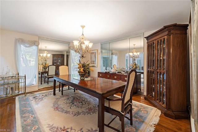 4401 Leatherwood Dr, Virginia Beach, VA 23462 - dining space with a chandelier, wood finished floors, and plenty of natural light