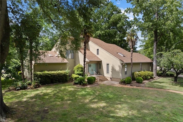 4401 Leatherwood Dr, Virginia Beach, VA 23462 - rear view of house with a yard and roof with shingles