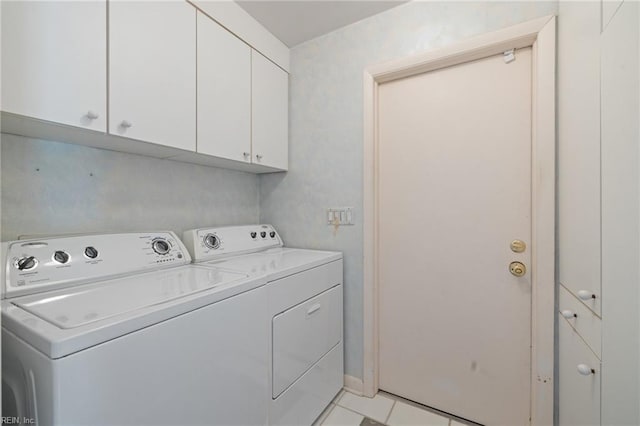4401 Leatherwood Dr, Virginia Beach, VA 23462 - washroom with washer and dryer, cabinet space, light tile patterned flooring, and baseboards