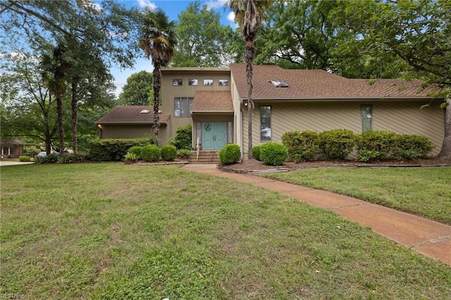 4401 Leatherwood Dr, Virginia Beach, VA 23462 - mid-century inspired home with a front yard and a shingled roof