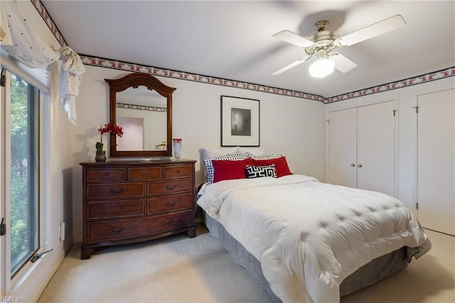 4401 Leatherwood Dr, Virginia Beach, VA 23462 - bedroom featuring light carpet, multiple windows, and a ceiling fan