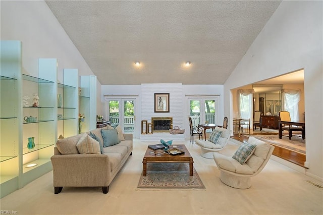 4401 Leatherwood Dr, Virginia Beach, VA 23462 - living area with high vaulted ceiling, a textured ceiling, french doors, and healthy amount of natural light