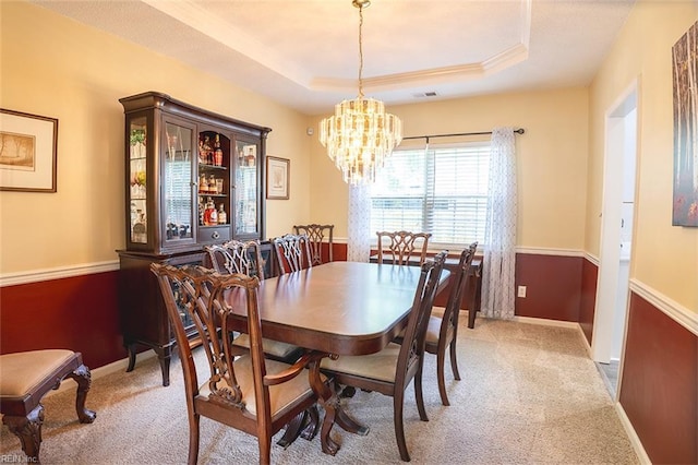 1660 Chestwood Dr, Virginia Beach, VA 23453 - dining area featuring a chandelier, a raised ceiling, light colored carpet, and baseboards
