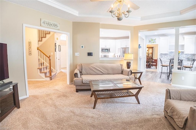 1660 Chestwood Dr, Virginia Beach, VA 23453 - living room with stairs, crown molding, a raised ceiling, light carpet, and baseboards