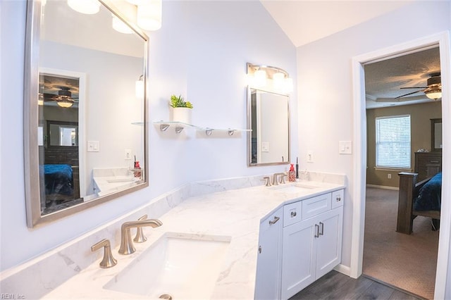 1660 Chestwood Dr, Virginia Beach, VA 23453 - bathroom featuring ensuite bath, a ceiling fan, double vanity, vaulted ceiling, and wood finished floors