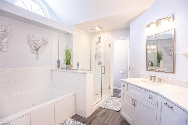 1660 Chestwood Dr, Virginia Beach, VA 23453 - full bathroom featuring wood finished floors, a stall shower, a bath, vanity, and lofted ceiling