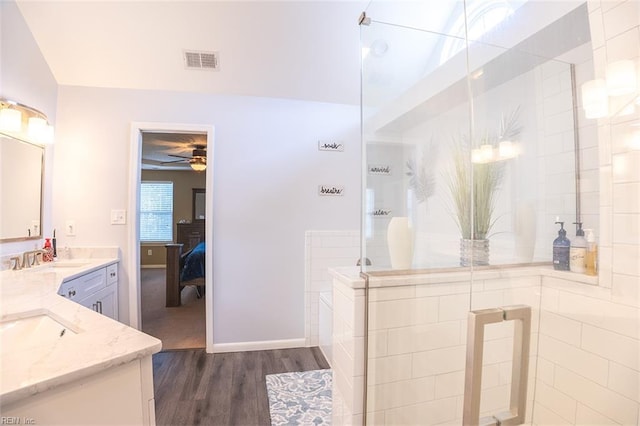 1660 Chestwood Dr, Virginia Beach, VA 23453 - ensuite bathroom with wood finished floors, vanity, a ceiling fan, a walk in shower, and baseboards