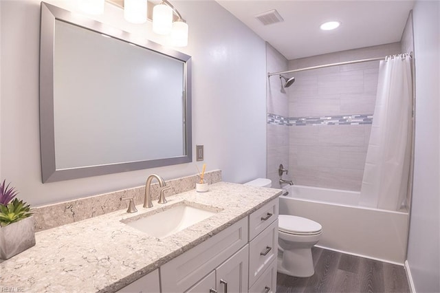 1660 Chestwood Dr, Virginia Beach, VA 23453 - full bath with wood finished floors, toilet, shower / bathtub combination with curtain, vanity, and recessed lighting
