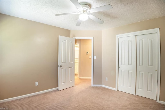 1660 Chestwood Dr, Virginia Beach, VA 23453 - unfurnished bedroom with light carpet, a closet, baseboards, a ceiling fan, and a textured ceiling