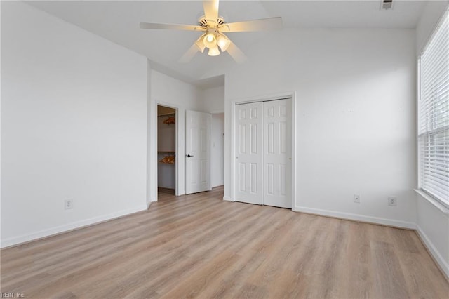 3200 Jade Ct Unit 301, Virginia Beach, VA 23451 - unfurnished bedroom with light wood finished floors, baseboards, two closets, and a ceiling fan