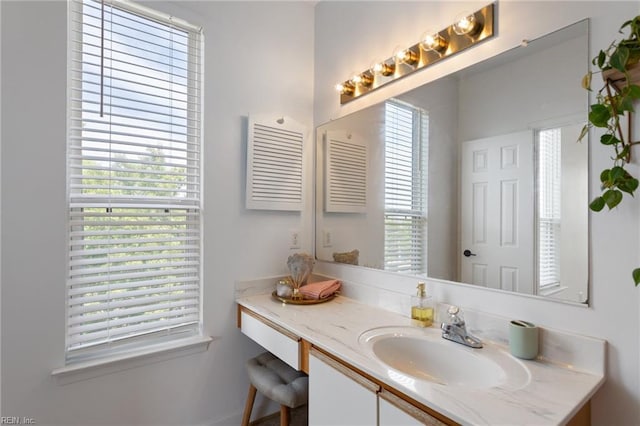 3200 Jade Ct Unit 301, Virginia Beach, VA 23451 - bathroom with vanity and plenty of natural light