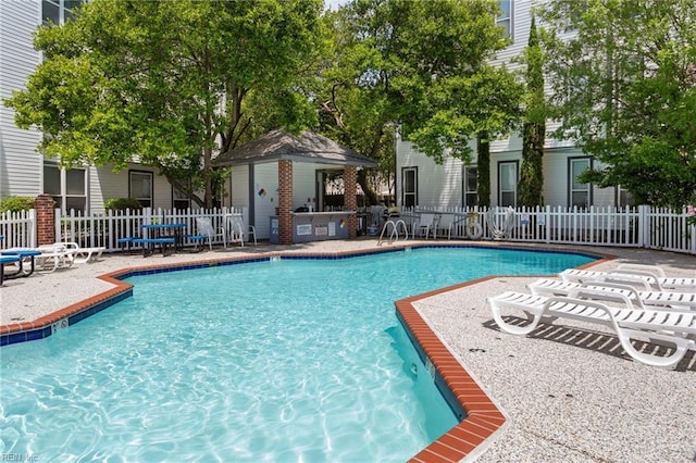 3200 Jade Ct Unit 301, Virginia Beach, VA 23451 - community pool featuring a patio area