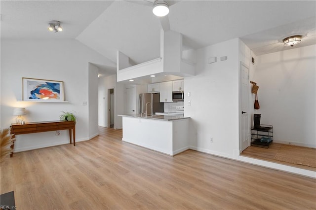 3200 Jade Ct Unit 301, Virginia Beach, VA 23451 - living area with light wood-type flooring, vaulted ceiling, baseboards, and ceiling fan