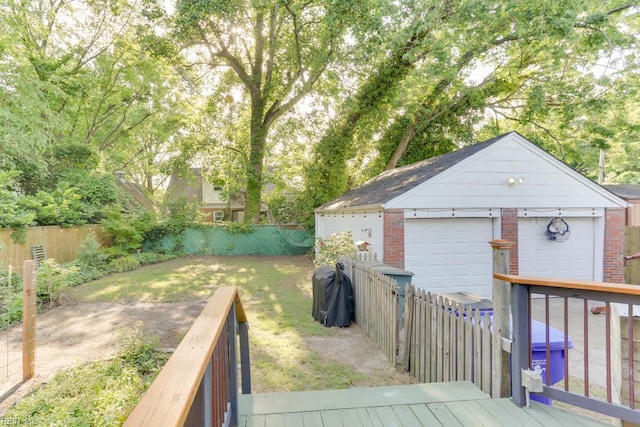 7811 Michael Dr, Norfolk, VA 23505 - wooden terrace with a fenced backyard, an outdoor structure, and a garage
