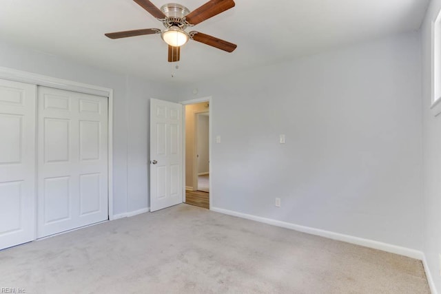 541 Mango Dr, Virginia Beach, VA 23452 - unfurnished bedroom featuring baseboards, light colored carpet, a closet, and a ceiling fan